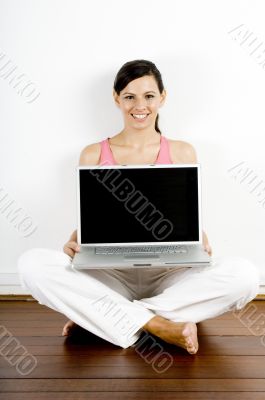 Holding Laptop