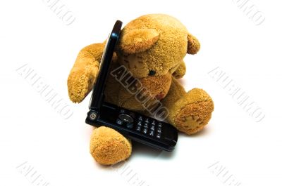 Toy Teddy Bear on Cellphone