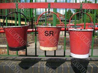 Three old fire buckets