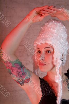 woman with tattoo and peruke