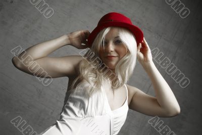 standing woman with hat