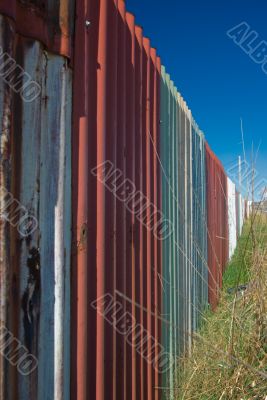Dilapidated Roadside Corrugated Iron Fence