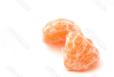 peeled tangerines on white