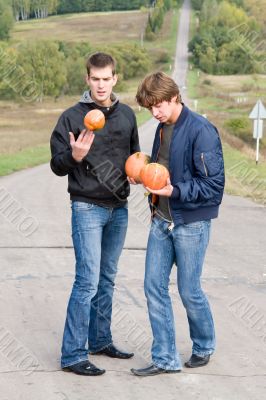 dudes with pumpkins