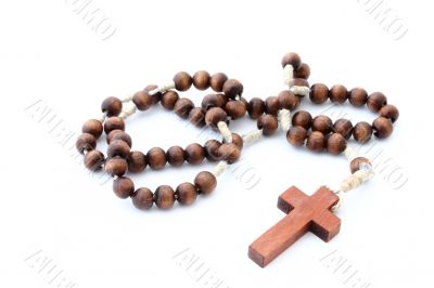 wooden rosary  on white