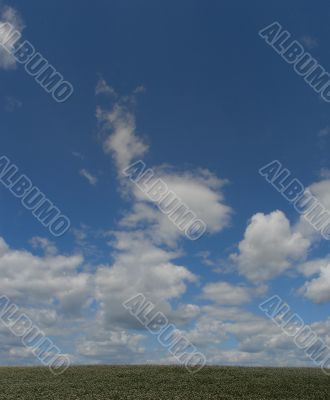 Blue cloudy sky wide angle view