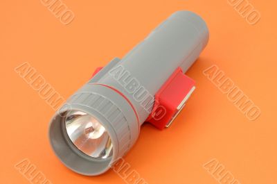 flashlight on orange