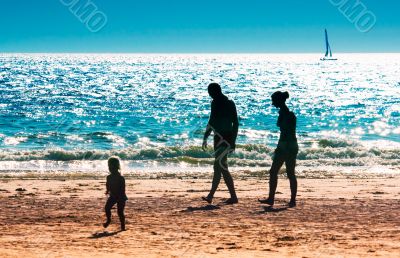 a family on the beach