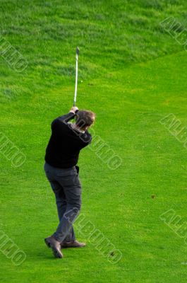 man playing golf