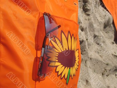 The sunglasses and a bag