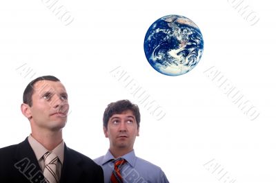 business team looking earth