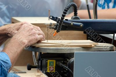 sawing wood