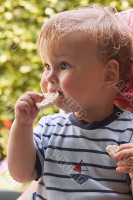 cute young boy eating
