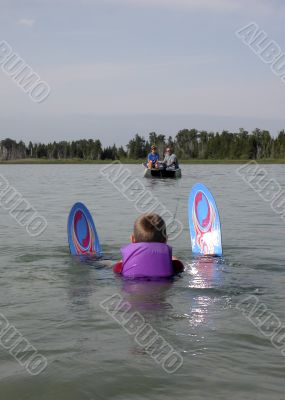 young boy ready to waterski