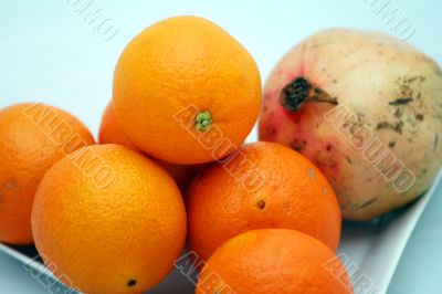 Pomegranate and oranges