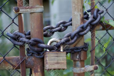 rusty locked gate