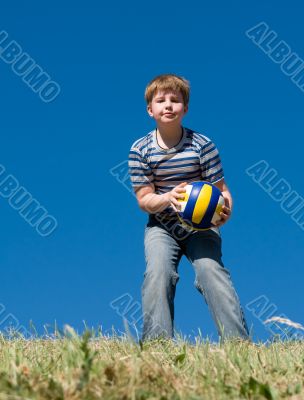 boy with volleyball ball
