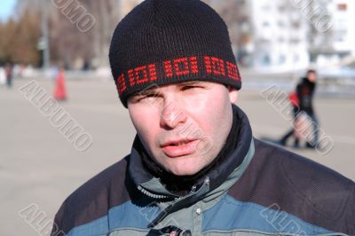 man in city street
