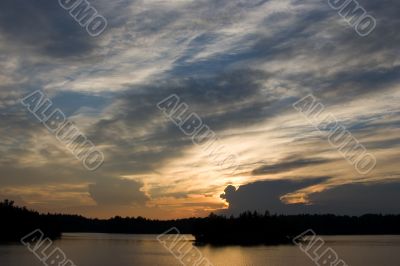 Sunset with the profile of bird