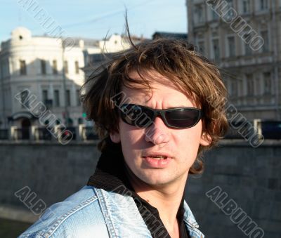 man in city street