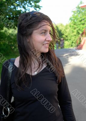 young woman in city street.