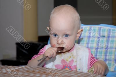 baby girl eating