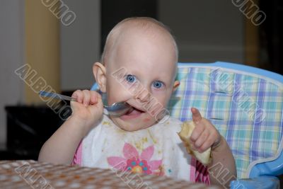 baby girl eating