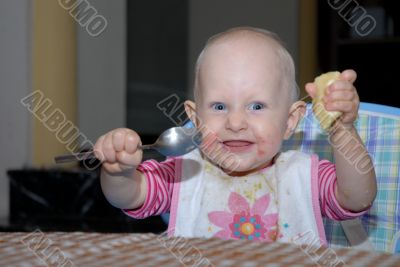 baby girl eating