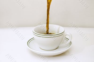 Pouring coffee cup