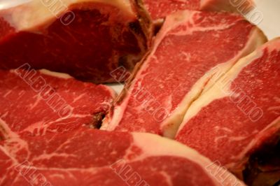 Thick Porterhouse Steaks Ready For Cooking