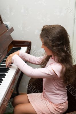 At the piano