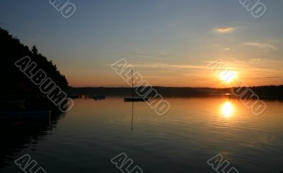 bay boats at sunset