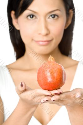Holding Pomegranate