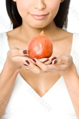 Holding Pomegranate