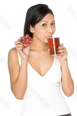 Woman With Pomegranate and Juice