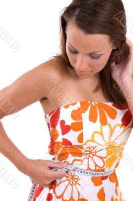 Checking her waist