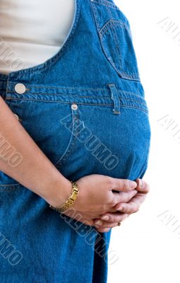 Pregnant woman holding her baby