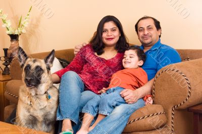 East Indian Couple with their son and dog