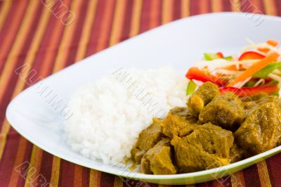 Goat Curry with Rice - Caribbean Style