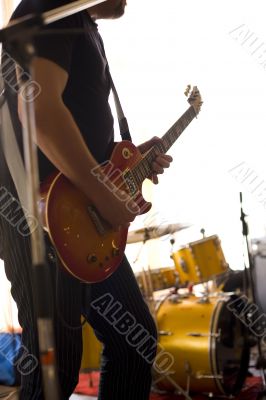 Musician play on guitar #4