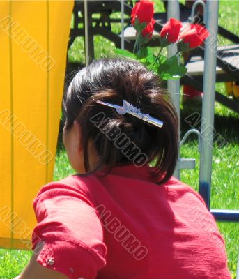 lady in red holding roses