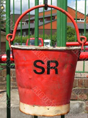 Old red fire bucket