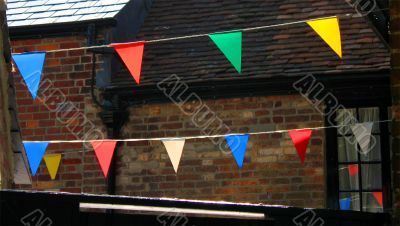Bunting flags draped across roofspace