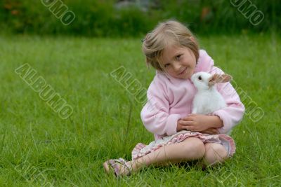 little girl with a rabbit