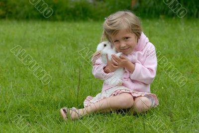 little girl with a rabbit