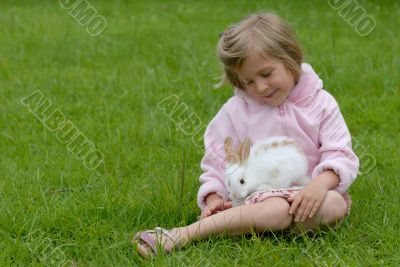 little girl with a rabbit