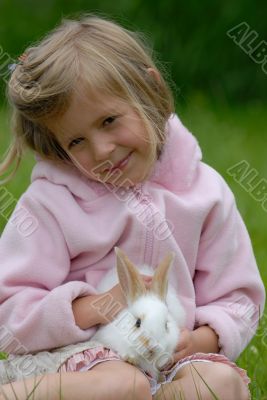 little girl with a rabbit