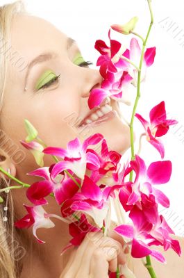 happy blond with orchid