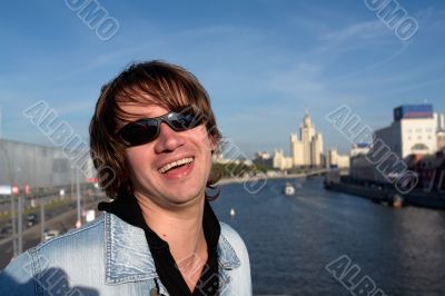 smiling man against Moscow