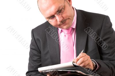 Concentrating on his notes